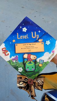 High school graduation cap!!! Featuring my flute, roller skates, future college, and marathon medals (+ music bow for marching band)