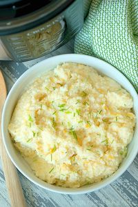 Here are some easy Crock Pot Express grits to have for breakfast or as a side dish! If you love cheesy grits this is a simple recipe to make in your pressure cooker in no time at all. No more stirring over the stovetop, just dump it all in and get ready to enjoy this traditional dish with your favorite add ins. #crockpotexpress #pressurecooker #instantpot #grits #breakfast