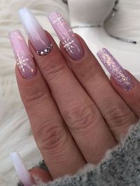 Long acrylic pink ombre nails with snowflakes