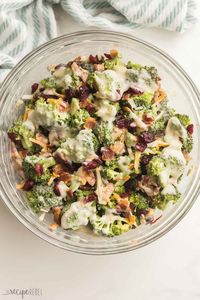 This easy recipe for Broccoli Salad keeps for days in the fridge and will quickly become a family favorite. Made from crunchy broccoli florets, this salad is tossed with a sweet and tangy homemade broccoli salad dressing! #broccoli #salad #dinner #recipes