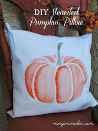 Stenciled Pumpkin Pillow. Looks like water color.