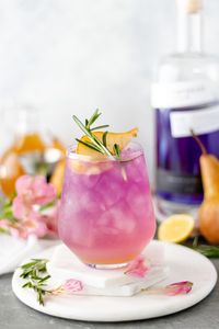 Since the holidays are among us, creating a drink that is fall inspired was obvious. And what better way than to use fresh pear, rosemary and a delicate, aromatic gin. This Empress Pear-Rosemary Gin Cocktail is sure to become a holiday favorite. | #cocktail #holidayrecipes #empressgin #ginrecipe #cocktailparty #recipesforparties alifedelicious.com via @alifedelish