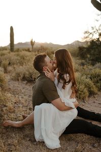 Desert Engagement Shoot Arizona | Engagement Photo Romantic | Arizona Photographer | This desert engagement session was so magical and romantic. Golden hour in the desert is such a vibe for engagement photos. See desert engagement outfits, boho desert engagement shoot, engagement photos in the desert arizona and romantic engagement photo ideas. Book my husband and I for your Arizona engagement photos or adventurous engagement photo and videography at kalimphotos.com!