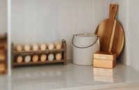 Detailed image of the retrofitted pantry with quartzite counter tops