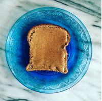 Whole Grain Toast With Nut Butter | 11 Nutritionist-Approved Late Night Snacks