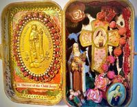 Portable pocket shrine or, alter with religious icons crafted from an Altoid tin box