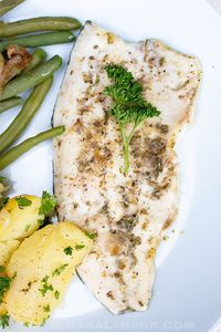 Pan Fried Trout Fillet Recipe - one pan fried fish with herbs. Easy seafood dinner meal ready within minutes and prepared with a few ingredients only. www.Masalaherb.com #trout #onepan #masalaherb