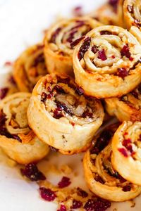 These buttery pie crust cookies, filled with sweet cranberries, crunchy walnuts, and a drizzle of honey, are a Christmas favorite! Easy to make and always a hit, they’re perfect for your holiday cookie tray!