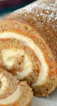 Perfect for Easter, this Carrot Cake Roll is full of Carrot Cake spice and filled with cream cheese frosting.