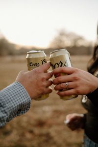 New Mexico-based photographer photographs a western engagement session for Mikayla and Isaiah, who were both dressed in their cowboy boots and hats, while they took photos with their horse, showing creative ways to elevate your engagement portraits.  #Albuquerquephotographer #Engagementportraits #Westernportraits