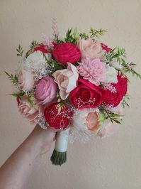 This beautiful mix of fuschia/hot pink and blush tones features handmade wooden flowers and faux greenery. Hand dyed and put together just for you, this bouquet will add the beautiful shades of pink to your event - perfect for any season and wedding theme! Pictured is 10 inches in diameter. To purchase matching boutonnieres, look here: https://www.etsy.com/shop/mydinosaurdreams/?section_id=21264911 To purchase matching corsages, look here: https://www.etsy.com/shop/mydinosaurdreams/?section_id=2