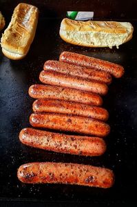 It’s simple: olive oil, granulated garlic and black pepper. Just a couple of changes transforms a hot dog from being an ordinary ‘dog to being the best damn hot dog you will have ever eaten in your entire life.