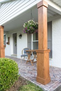 How to wrap existing porch columns in stained wood and build a craftsman style base unit to add character and curb appeal to your front porch.