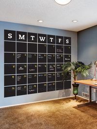 Chalkboard Calendar Wall Decal - Extra Large Stay organized with the help of our extra large chalkboard wall calendar. This calendar wall decal incorporates a black chalkboard vinyl that you can write on and erase. It is applied directly to the wall.