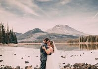 This beautiful wintery lake elopement takes place along Cascade Lakes Highway in Sisters, OR. Photos by Amy Booker Photography, Oregon Wedding Photographer.