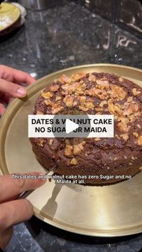 Karan Gulati on Instagram: "Dates and Walnut Cake - We tried this amazing cake at home with zero sugar and maida and it’s turned out mighty impressive. 

Ingredients:

Dates 200 g 
Milk 1 ½ cup 
Desi Ghee ½ cup 
Wheat Flour Atta 1 cup
Baking Soda 1 teaspoon 
Baking Powder 1/2 teaspoon 
Salt 1/4 teaspoon 
Cacao Nibs 1 ½ tablespoon
Chopped walnuts

Recipe:

Soak dates in hot milk for about an hour until they become soft. Then blend it and make a fine mixture. 

Now add desi ghee to this puree, you can also add refined oil or extra light olive oil and mix it properly. 

Now sieve all the dry ingredients and add it in the dates and oil mixture until it is lump free. 

Take a greased cake mould and pour the batter in the mould. To this, add cacao nibs and mix them well and garnish with chopped 