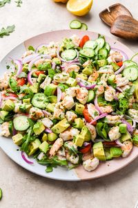 This healthy, cold shrimp and avocado salad is an ideal weeknight dinner. Quick and easy to make, and oh-so-yummy! Made with a fresh array of ingredients like cucumber, tomatoes, red onion, avocado, and arugula. All tossed in a bright, crave-able lemony dressing (without mayo!). Ready in less than 30 minutes!