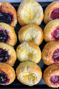 Homemade kolaches make for an impressive and delicious breakfast, dessert, or snack. While they may look intimidating to make, this kolache recipe is a cinch and great for cooks looking to try a new spin on classic pastries! These are the perfect weekend treat, especially fresh from the oven!