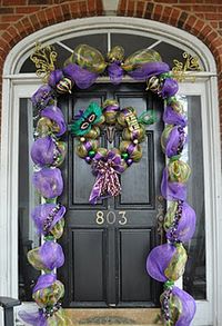 mardi gras door...through out holidays shops and homes decorate their entry ways with such displays...Christmas, Easter, Fall and MG are celebrated in Louisiana style...