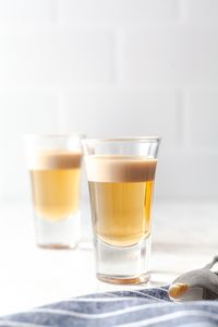 This buttery nipple is one of my favorite layered shot recipes! It’s sweet, simple, and fun to make and drink. #shot #cocktail #irishcream