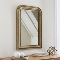 Designed in the classic Louis Philippe style, the iconic rounded shoulders and squared base of our Louis Mirror strike a perfect balance between casual curves and crisply tailored lines. Louis Mirror features: Richly molded & beadedComposite frameBeveled glass