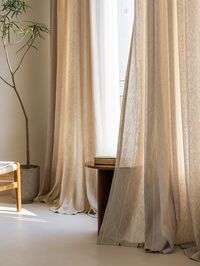 Light-filtering yet with a pleasing heft, our striped linen curtains brings a dash of vintage charm to your home. Made from designed linen blend fabric, this curtain boasts a linen texture that is both soft to the touch and visually appealing. As it fills the home with its understated beauty, it will also keep out unwanted sources of light, heat, and cold air. It offers privacy and comfort in your home. Handcrafted by skilled artisans, our Harlan Linen Curtain will enrapture you with simple form