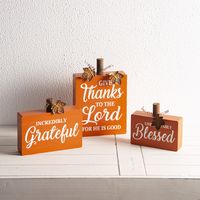 One set contains 3 different size. Warm traditional orange color MDF pumpkin block with wood stem and metal leaves. Blessing words for harvest and giving thanks holidays in each block. Glitzhome Pumpkin Tabletop Decoration (3-Pack) in Orange | GH2005500015