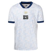 Men's Replica Umbro El Salvador Away Jersey 2023. The 2023 El Salvador Away Jersey features a graphic pattern that is a nod to the country's Mayan heritage. Join Eriq Zavaleta, Alex Roldan, and Marvin Monterroza, and wear it with pride. - White with blue graphics. - ES badge mid-chest. - Federation logo on the back collar. Sweat-wicking fabric. 100% Polyester. Official merchandise.