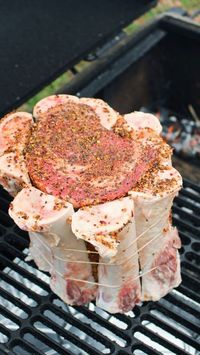 ‘Tis the season for large family gatherings and a plentiful feast to feed them all. Now that turkey day is over, our minds and appetites switch gears back to beef. Prime Rib is my favorite holiday feast centerpiece, and this year we did it big! I needed to try a unique prime rib recipe. A tender, juicy and fat marbled hunk of prime rib wrapped in halved bones and smoked for a perfect medium rare slice. I call it: The Shotgun Prime Rib.