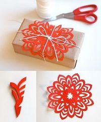 DIY Paper flowers. A nice way to decorate packages without buying wrapping paper or bows.