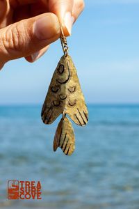 Add a unique marine touch to your style with these imperfect, rustic fish earrings handcrafted in textured and antiqued brass. Click on the link for more ocean inspired and marine life jewelry!