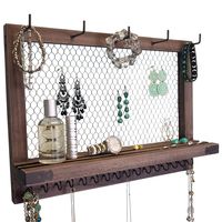 PRICES MAY VARY. SPACE SAVER: Save space on your vanity dresser and accentuate your vintage room decor with this wall jewelry organizer where you can see all your cute necklaces, earrings, bracelets, watches, and hair accessories and easily pick out what to wear. 25% LARGER THAN MOST: This wall jewelry organizer wall mounted can securely hold your daily jewelry essentials. It measures 11.5" x 16" x3.5" with added brackets in the back for your dangle earrings, and it is bigger than most competito