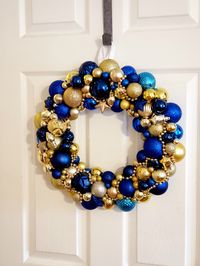 Blue and Gold Christmas Ornament Wreath Christmas Mantel Decor Winter Wreath Christmas Gifts Front Porch Decor Xmas Wreath Easy Gift Ideas #wreathsforfrontdoor #christmaswreaths #winterwreath #christmasgiftsideas #giftformom #frontporchdecor #manteldecor #holidaydecorating