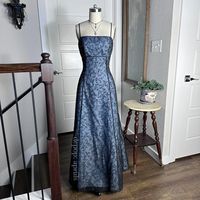 Vintage 90s formal prom dress, blue with a black sheer mesh overlay fabric, velvet beaded floral flower pattern, empire waistline, lace up tie open back.     Marked as size 8  Measurements: taken laying flat, soon  Condition: excellent  #vintagepromdress #promdress #vintageformaldress #2000spromdress #goth goth whimsygoth fairy vampy blondie nites Morgan co ball gown dance