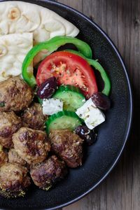 Keftedes Greek Meatballs Recipe | The Mediterranean Dish. Best Greek meatballs ever! Spiced with fresh mint, oregano and more, pan-fried in olive oil then finished with a thick lemony sauce. Serve it with pita and Greek salad and you've got an amazing Greek dinner! See the easy recipe on TheMediterraneanDish.com #greekmeatballs #meatballs #meatballrecipe #greekfood #greekrecipe