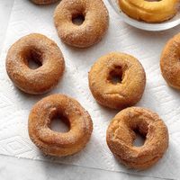 Our cake donut recipe makes sweet treats that are piping hot, decadent and satisfying! The cinnamon-sugar coating complements the fried dough perfectly.