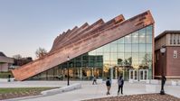 BIG wraps Massachusetts university building with "domino effect" copper walls