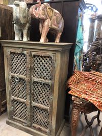 Indian Antique Hand Carved Wooden Cabinet with front 2 door Three shelves for plenty of storage, this is the perfect piece for your bedroom. Unique style and design to your home interior.beautiful and amazing almirahs. W 35" / D 16" / H 52" / 140 lb.