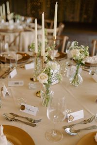 British countryside wedding with classic florals, somerset wedding, cornwall wedding, wedding photography, wedding dress, sage wedding, white roses wedding, wedding flowers, classic wedding day, barn wedding, country wedding, first kiss, wedding table designs, wedding candles, wedding table set up