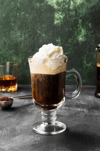 Nothing fancy here — just Bushmills Black Bush Irish Whiskey, simple syrup and hot coffee in a mug, topped with whipped cream. It�’s the definition of a simple, classic Irish coffee cocktail that’s been enjoyed since its invention in 1943.