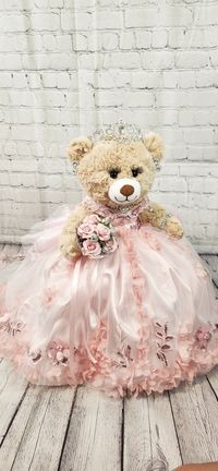 "Custom Personalized Quinceanera Bear/Last Doll/Oso made to look just like the quinceanera's dress. Attention to detail is my forte.  Includes the 20\" bear, dress, tiara, lashes, bouquet and jewelry. Please allow more than 8 weeks to make the bear.  May be longer during peak season.  Please message me with the following information: - Pictures of the front and back of the dress. - Color description as sometimes the pictures may appear differently.  - Date of the Quinceanera - Color of accessori