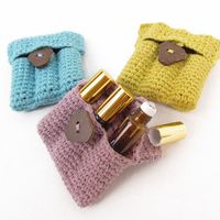 Crocheted Carry Pouch for essential oils with 3 amber roll-on 5ml bottles included.  Essential oil essentials from Rivertree Life. (Bottle Bag Crochet)