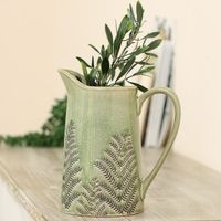 Stylish sky blue pitcher jug vase Perfect for showcasing your favourite flowers Measures H22.5 x W10.5 x D20cm The pitcher jug has a large, practical curved handle and a generously sized cup The country design adds extra natural style and texture Brambly Cottage Colour: Green