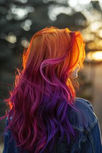 Blending from fiery red to deep purple, this sunset ombre hair mimics the evening sky, offering a beautiful and captivating look for festival evenings.