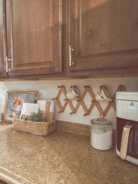 Peg rail decoration in kitchen, vintage inspired cabinet pulls, cottage inspired, thrifted kitchen decor