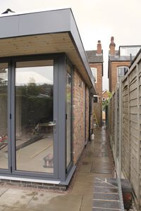 Corner Doors to extension