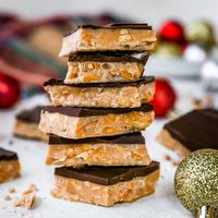 The Best Homemade Almond Toffee Recipe! This almond toffee is made from scratch with 8 ingredients, and is the most delicious holiday treat, perfect to give as gifts to neighbors and friends! Learn how to make toffee with our step-by-step photos and video!