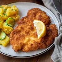 This homemade chicken schnitzel recipe takes less than 15 minutes to make and needs just 6 ingredients! Crispy, moist, and delicious.