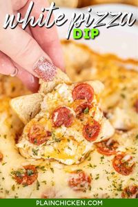 White Pepperoni Pizza Dip - seriously delicious! I could make a meal out of this Garlicky baked cheese and pepperoni dip! Super easy to make with only 5 ingredients. Lipton Herb & Garlic Soup Mix, sour cream, ricotta, mozzarella and pepperoni. Serve with crusty french bread. Makes a GREAT appetizer! There is never any left when I take this to a party!! #dip #pizza #appetizer #cheese