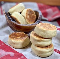 Crunchy, tangy, and so easy to make...these Sourdough English Muffins will bring a smile to your face and another use for your sourdough starter discard!